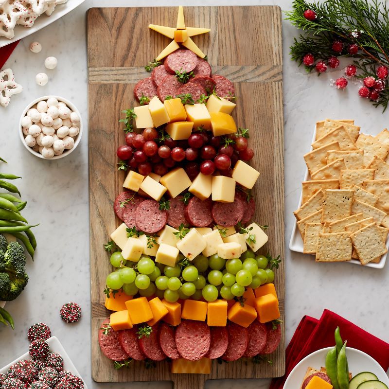 Charcuterie board in the shape of a Christmas tree.